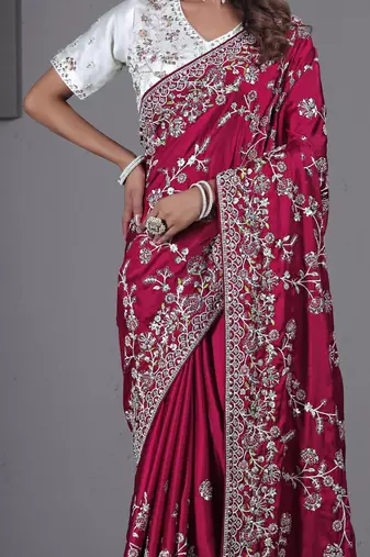 soft silk blend rani embroidered in multi-colored satin saree with unstitched blouse