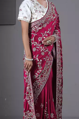 soft silk blend rani embroidered in multi-colored satin saree with unstitched blouse