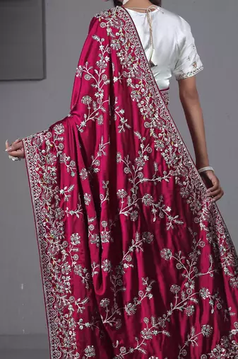 soft silk blend rani embroidered in multi-colored satin saree with unstitched blouse