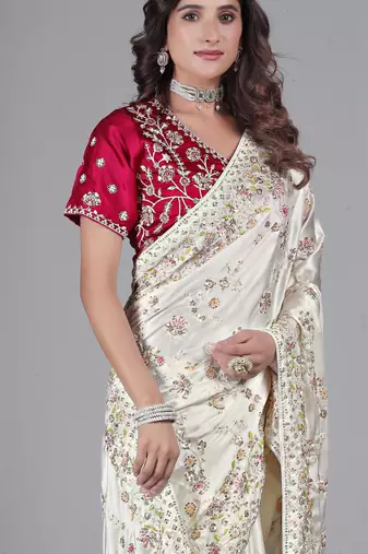 Celebrity type white embroidered in multi-colored satin saree with unstitched blouse