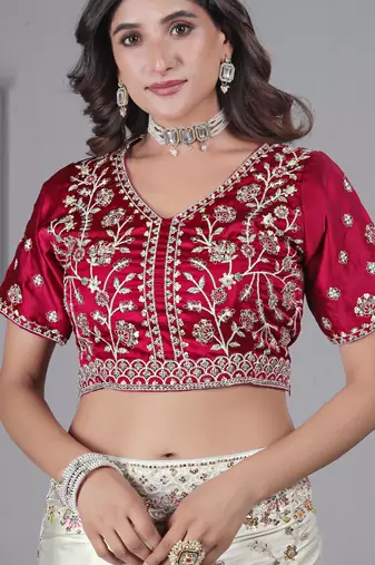 Celebrity type white embroidered in multi-colored satin saree with unstitched blouse