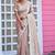 Trendy champagne beige multicolor floral buti embroidered border fandy satin saree with unstitched blouse