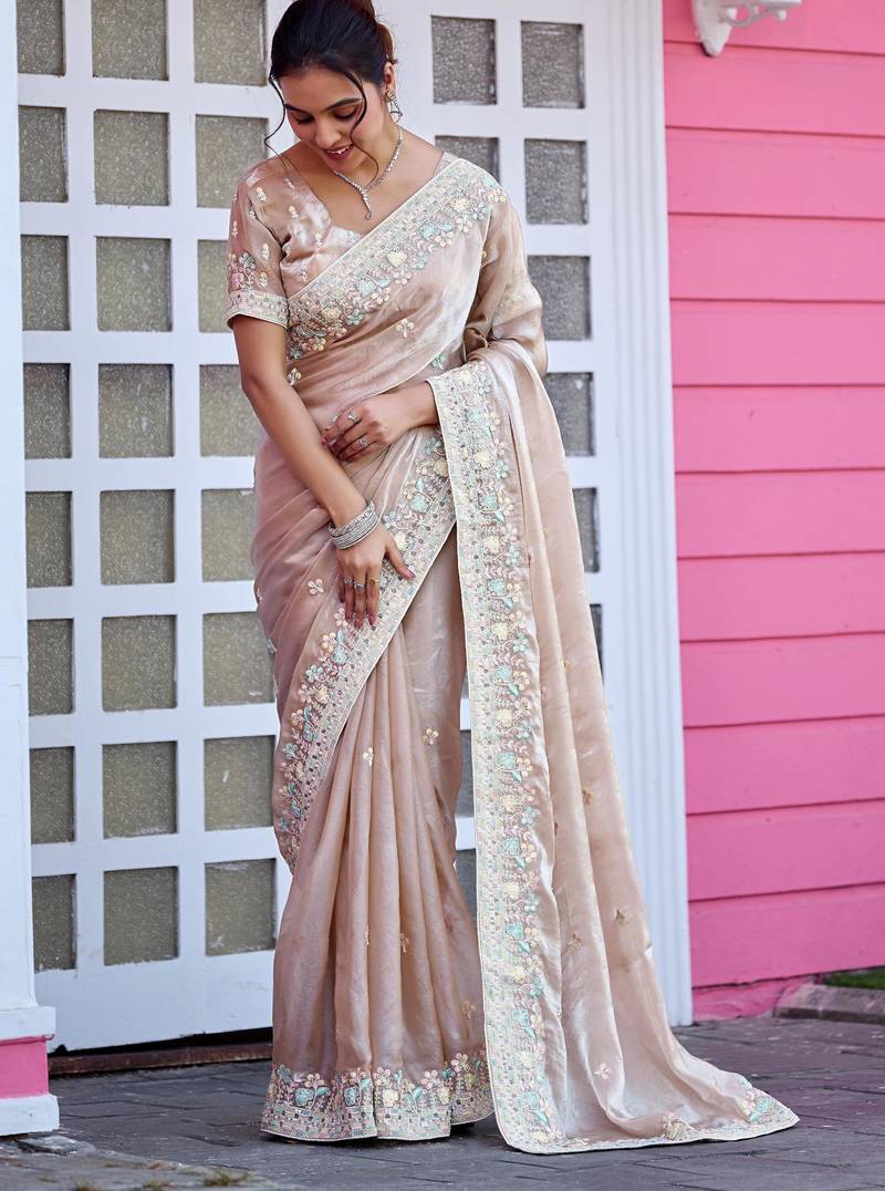 Trendy champagne beige multicolor floral buti embroidered border fandy satin saree with unstitched blouse