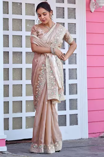 Trendy champagne beige multicolor floral buti embroidered border fandy satin saree with unstitched blouse