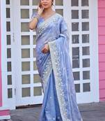 Traditional powder blue multicolor floral buti embroidered border fandy satin saree with unstitched blouse