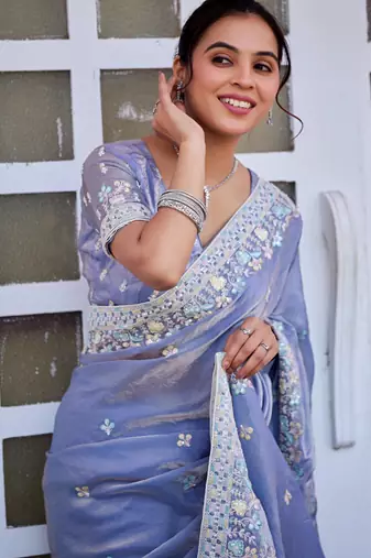 Traditional powder blue multicolor floral buti embroidered border fandy satin saree with unstitched blouse