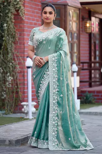 Indian sage green multicolor floral buti embroidered border fandy satin saree with unstitched blouse