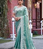 Indian sage green multicolor floral buti embroidered border fandy satin saree with unstitched blouse