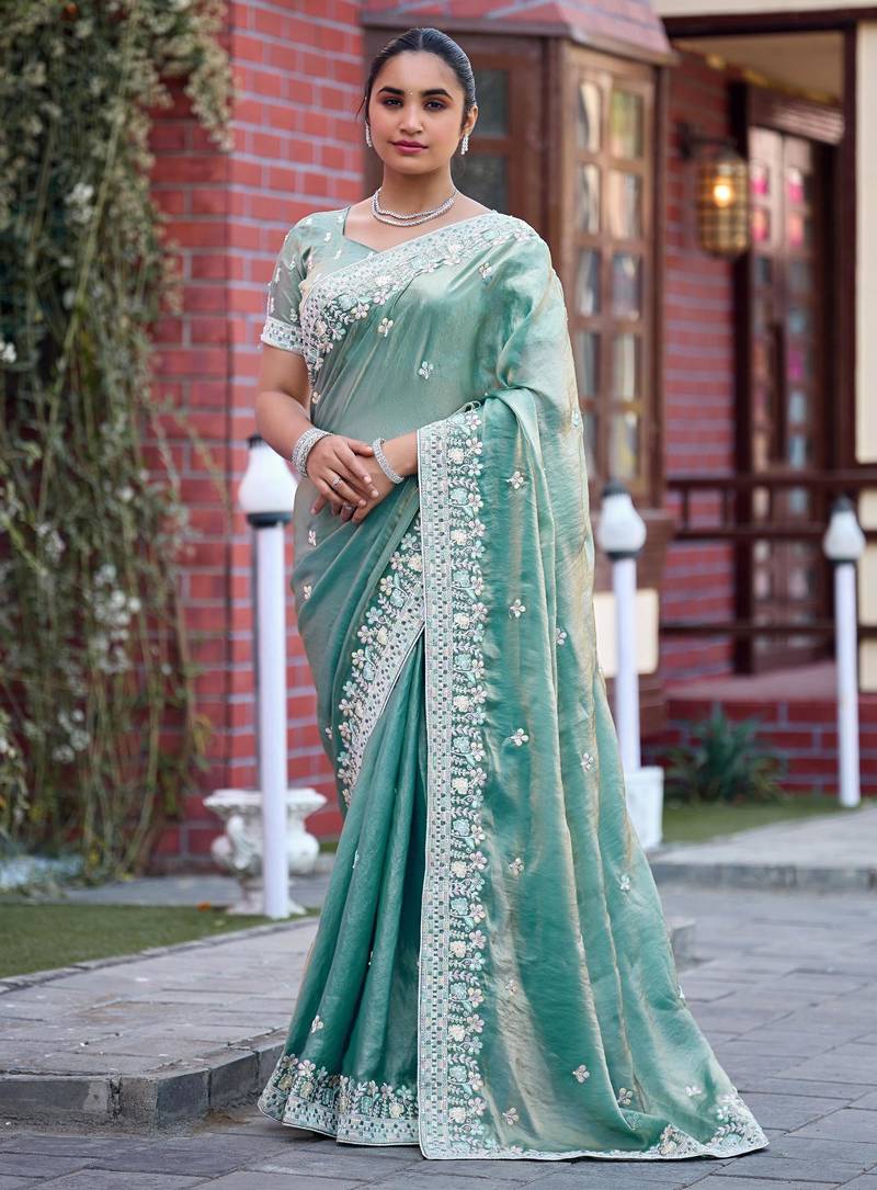 Indian sage green multicolor floral buti embroidered border fandy satin saree with unstitched blouse