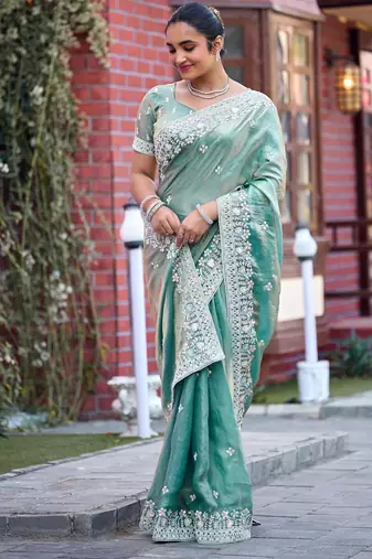 Indian sage green multicolor floral buti embroidered border fandy satin saree with unstitched blouse