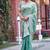 Indian sage green multicolor floral buti embroidered border fandy satin saree with unstitched blouse