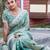 Indian sage green multicolor floral buti embroidered border fandy satin saree with unstitched blouse