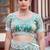 Indian sage green multicolor floral buti embroidered border fandy satin saree with unstitched blouse