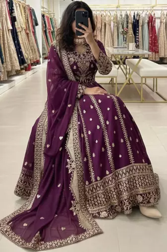 Purple faux georgette embroidered flared gown set