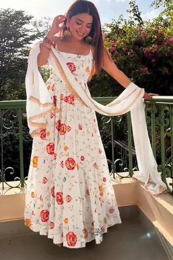 Off-white silk blend embroidered flared gown set