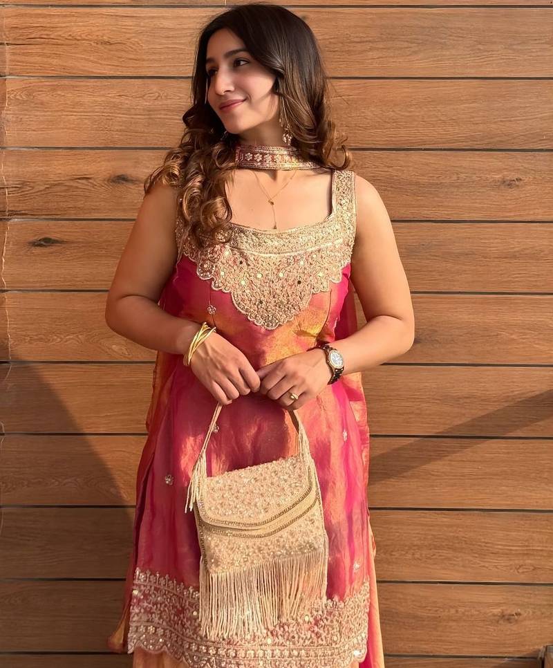 Rani pink fendy kurta sharara set with choker dupatta