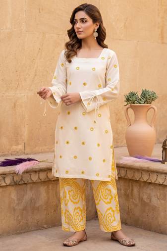 Women's off white embroidered kurta with yellow printed farshi pant