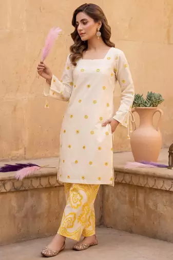 Women's off white embroidered kurta with yellow printed farshi pant