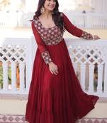 Maroon color faux georgette embroidered gown