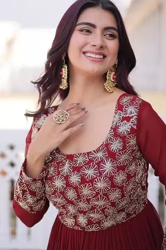 Maroon color faux georgette embroidered gown
