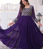 Purple color faux georgette embroidered gown