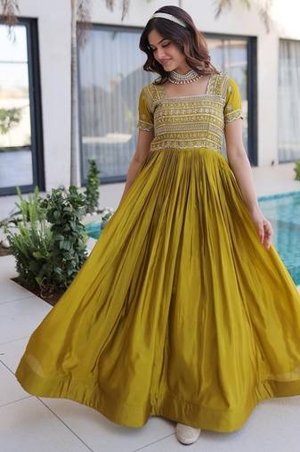 Mehendi color fancy fabric embroidered work readymade gown