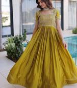 Mehendi color fancy fabric embroidered work readymade gown