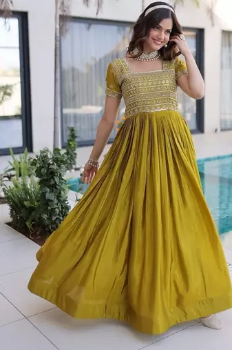 Mehendi color fancy fabric embroidered work readymade gown