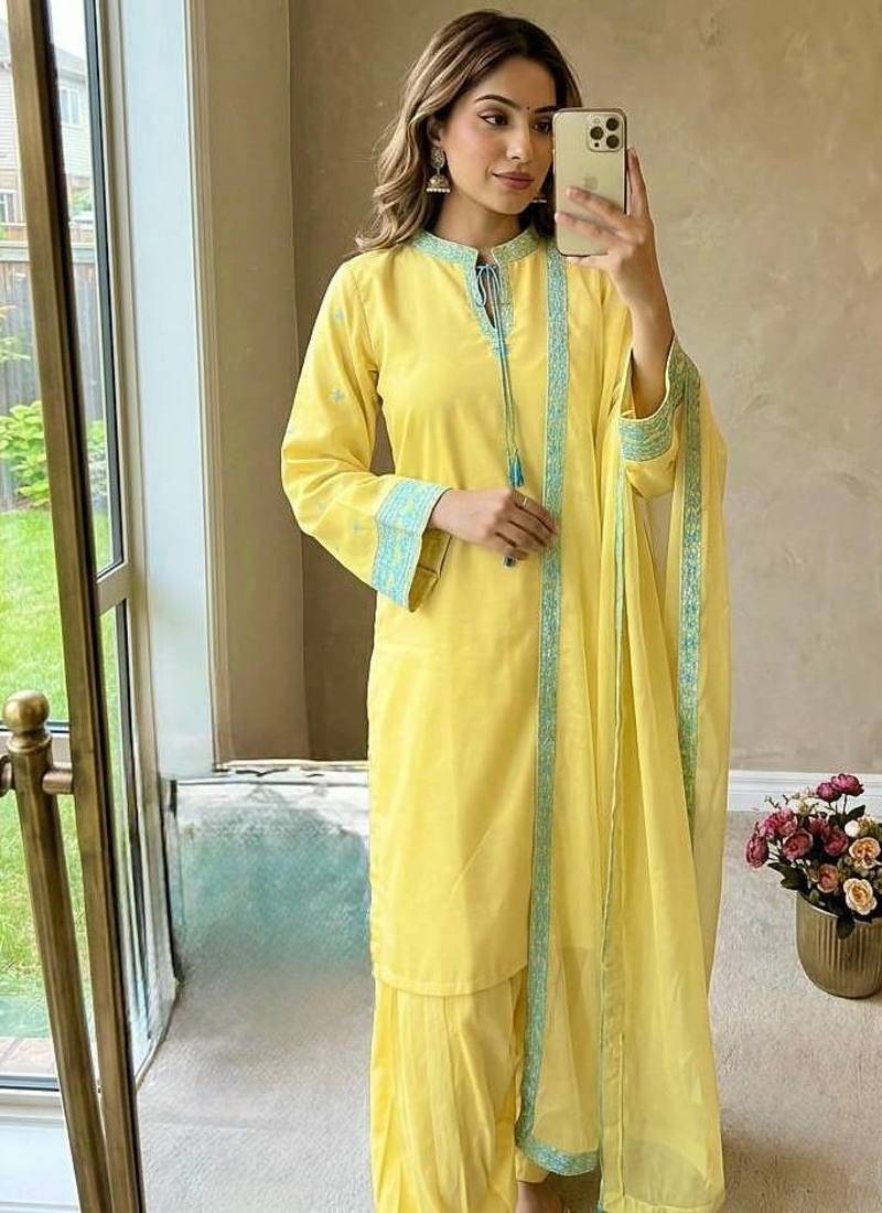 Yellow crepe silk kurta set with organza dupatta