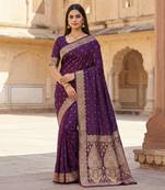 Wine soft banarasi silk blend saree with self weaving design zari weaving pallu and blouse
