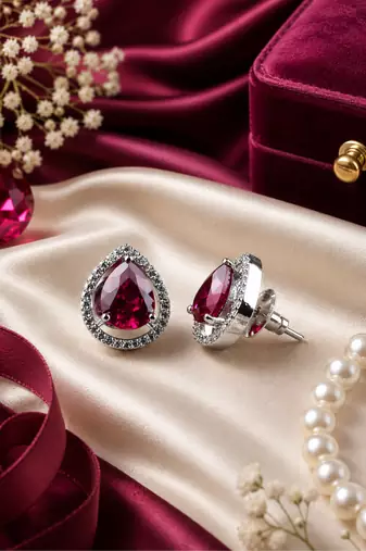 Rhodium finish ruby radiance teardrop studs