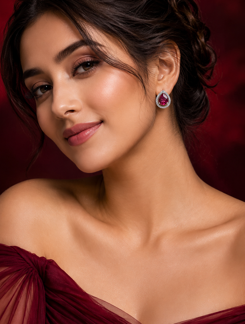 Rhodium finish ruby radiance teardrop studs