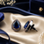 Sapphire shine teardrop studs