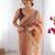 Orange soft dual shade gold net saree with sequence lace border