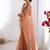 Orange soft dual shade gold net saree with sequence lace border