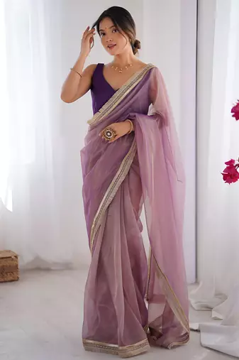 Light purple soft dual shade gold net saree with sequence lace border