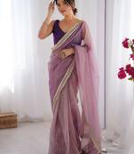 Light purple soft dual shade gold net saree with sequence lace border