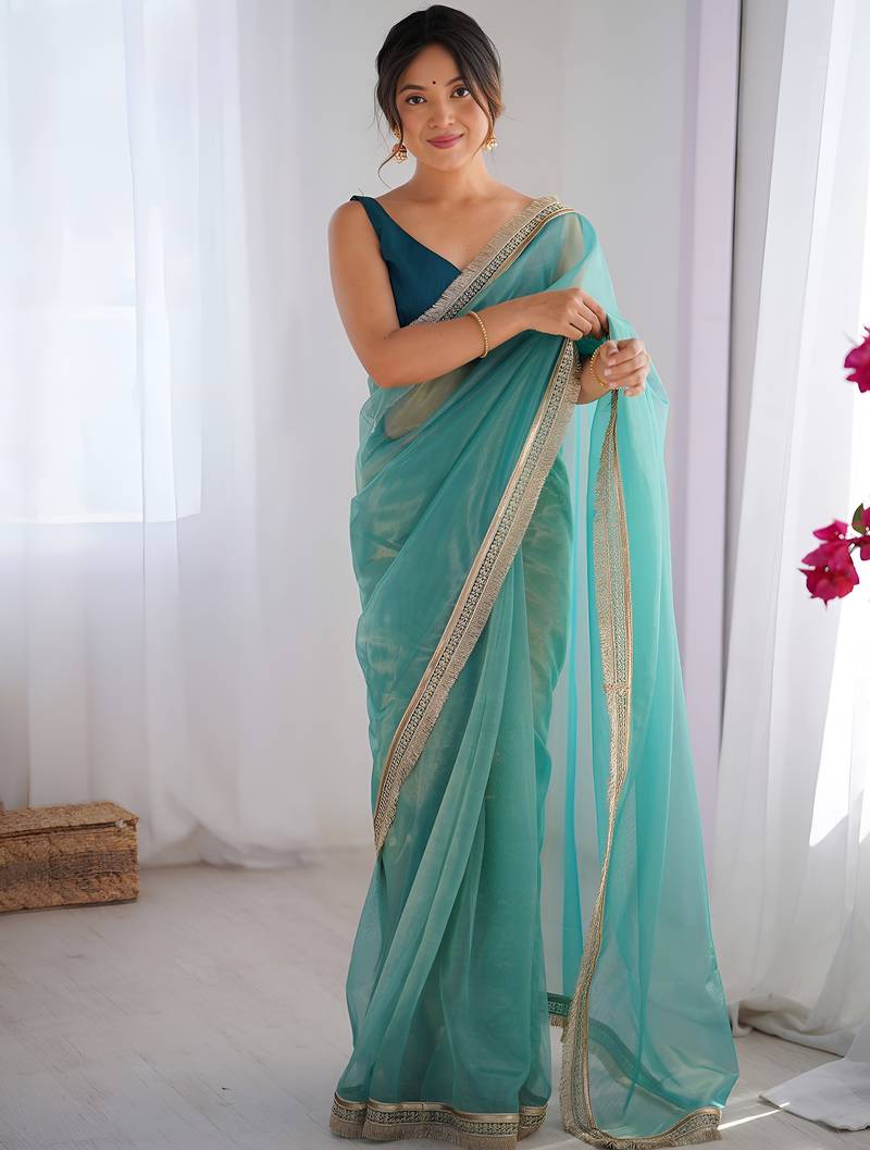 Aqua blue soft dual shade gold net saree with sequence lace border