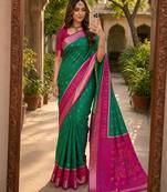 Green color pochampally silk blend ikkat pattern zari woven border sarees