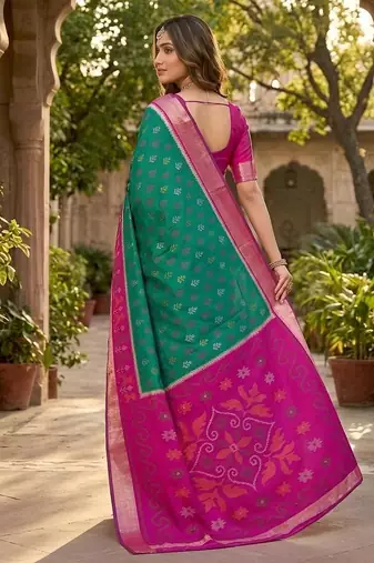 Green color pochampally silk blend ikkat pattern zari woven border sarees