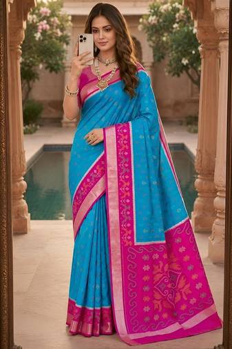 Sky blue color pochampally silk blend ikkat pattern zari woven border sarees