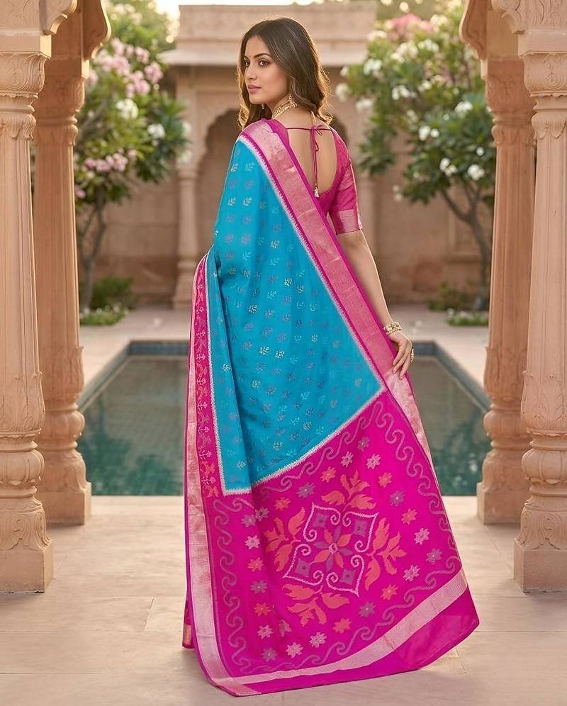 Sky blue color pochampally silk blend ikkat pattern zari woven border sarees