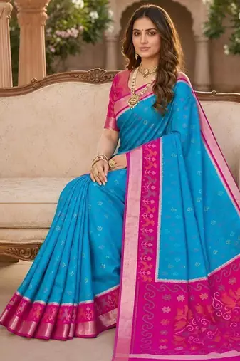 Sky blue color pochampally silk blend ikkat pattern zari woven border sarees
