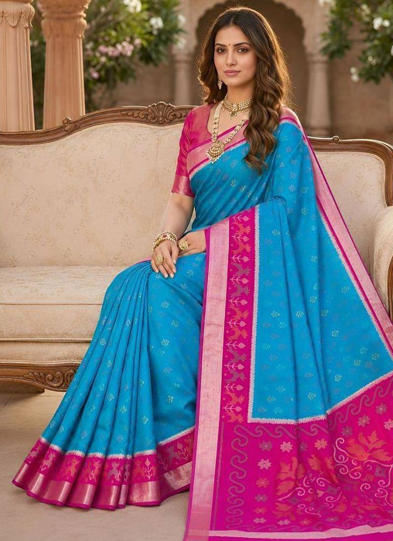 Sky blue color pochampally silk blend ikkat pattern zari woven border sarees