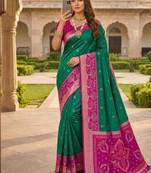 Green color pochampally silk blend ikkat pattern zari woven border sarees