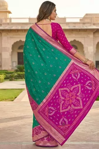 Green color pochampally silk blend ikkat pattern zari woven border sarees