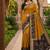 Mustard color pochampally silk blend ikkat pattern zari woven border sarees