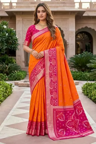 Orange color pochampally silk blend ikkat pattern zari woven border sarees