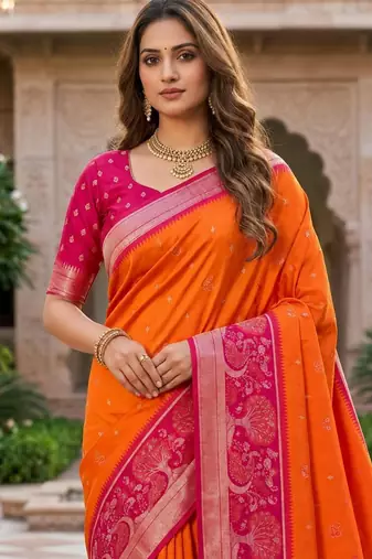 Orange color pochampally silk blend ikkat pattern zari woven border sarees