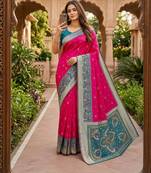 Rani pink color pochampally silk blend ikkat pattern zari woven border sarees